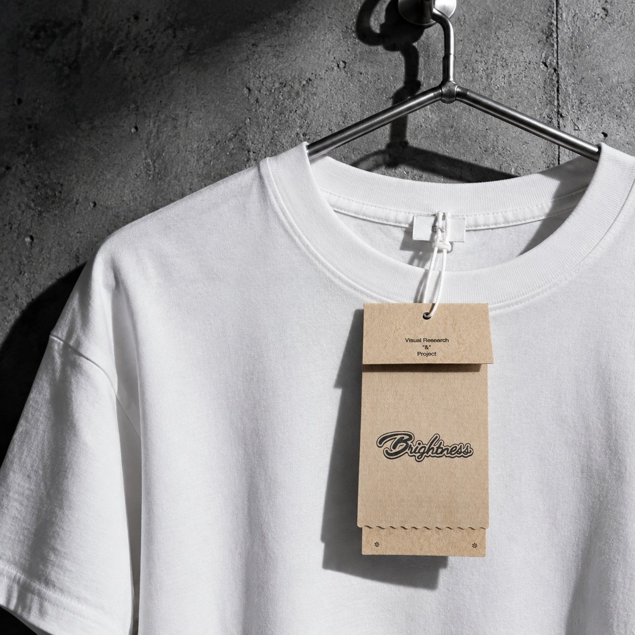 Natural kraft paper hang tag set on a white T-shirt